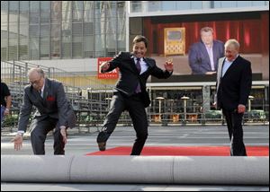 Emmys host Jimmy Fallon, center, says, 'It is a crazy-good year for TV.' There is a lot of buzz around new shows 'Glee' and 'Modern Family'.
