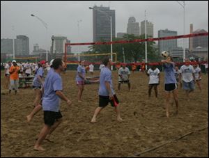 Corporate teams participate in the 19th annual Polly Hylant-Tracy Volleyball Tournament at International Park. <br>
<img src=http://www.toledoblade.com/graphics/icons/photo.gif> <font color=red><b>VIEW GALLERY:</b></font> <a href=