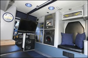 The Jambulance boasts a 32-inch flatscreen TV equipped with satellite TV and video game hookups, a generator, stereo, two onboard computers, touchscreen monitors, and a full-size grill.