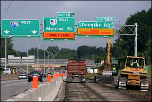 Widening and reconstruction of I-475 in West Toledo, which is to take about three years, currently has about 100 workers, and more are to be added.