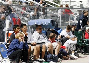 Fans line a fence to watch the National Three-Wall Championships at the Recreation Center, where a facility was built in the 1970s as a prototype.