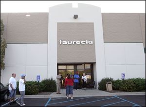 Faurecia Interior Systems in Northwood manufactures door panels for the Jeep Liberty and Dodge Nitro sport utility vehicles.