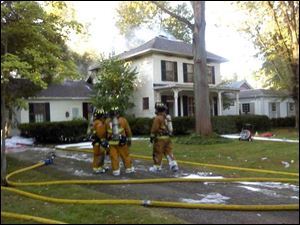 Fire crews used foam to battle the blaze in hopes of not damaging the historic home further.