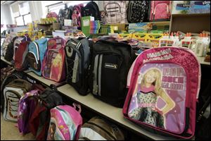 Backpacks wait to be chosen.