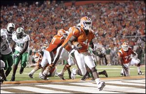 Bowling Green's Jordan Hopgood scores a touchdown in the second quarter against Marshall at Doyt Perry Stadium. The Falcons earned their first win of the season in their home opener.