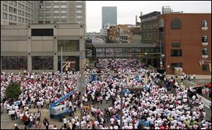 Participants packed Summit Street in Toledo for the 2009 race. Organizers hope to surpass last year's turnout of 18,129 and $925,000 in donations.
