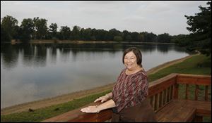 Sandy Gratop, a naturalist at Sylvania's Olander Park, supports an initiative by the state, ‘Leave No Child Inside,' to encourage children to play outside more often and experience nature.
