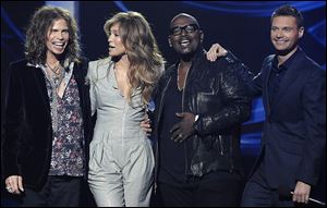Aerosmith frontman Steven Tyler,left, and singer-actress Jennifer Lopez will join Randy Jackson and Ryan Seacrest, far right, on the next season of 'American Idol.'