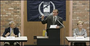 Rich Iott, the Republican challenger and his opponent, 9th District U.S. Rep. Marcy Kaptur (D., Toledo), are introduced at a forum in Sandusky by moderator Tim Kelly. 