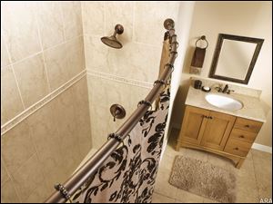 Installing a curved shower rod will add up to 7 1/2 inches of elbow room to your space and feel like you have an oversized, lavish shower without adding any square footage. 
