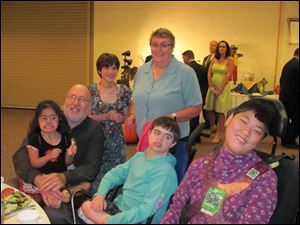 Becky and Mike Dornoff enjoy the evening with a few of their 20 children.