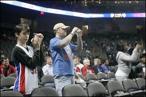 Joshua Jacobs, 13, was one of many fans dressed in Pistons attire as Detroit played in Toledo for the first time in 21 years.
