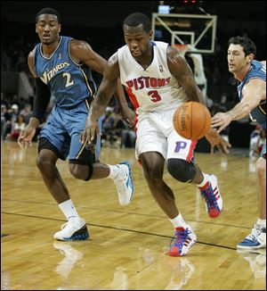 The Pistons' Rodney Stuckey slashes through the Wizards' defense. He was the star of the night with 34 points in Detroit's win.
