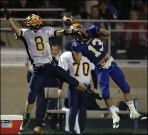 Northwood's John Romstadt breaks up a pass intended for Toledo Christian's Sam Ivan.