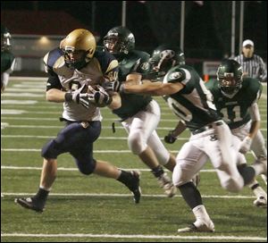 Kent Kern carried the ball 12 times for 73 yards and a touchdown as St. John's defeated Medina.
<br>
<img src=http://www.toledoblade.com/graphics/icons/photo.gif> <font color=red><b>VIEW GALLERY:</b></font> <a href=