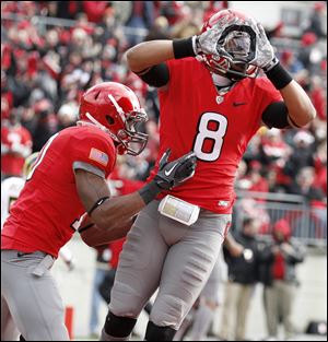 A taunting gesture by OSU wide receiver DeVier Posey in the second quarter earns a penalty after Posey scored a touchdown. Several altercations resulted in off-setting penalties.