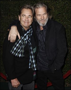 Jeff Bridges, right, poses with his brother Beau at the Los Angeles premiere of ‘True Grit' on Thursday.