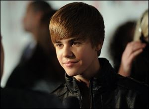 2011 calendars featuring teen heartthrob Justin Bieber have been flying off the shelves.