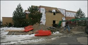 BIZ BUILD26p  The Blade/Lori King  12/21/2010  J C Contracting workers remodel what will be a Longhorn Steakhouse on Talmadge Rd. in Toledo, Ohio.