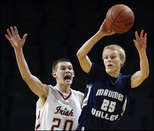 Central Catholic's Drew Lehman, left, applies the defensive pressure to Maumee Valley Country Day's Fredrick Deichert. Lehman scored 12 points for the Irish, while Deichert led the Hawks with 13 points.
<br>

<img src=http://www.toledoblade.com/graphics/icons/photo.gif> <font color=red><b>VIEW GALLERY:</b></font> <a href=