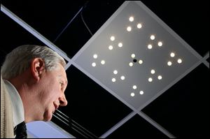 Clusters of LED lights that provide lighting for the workspace receive and transmit data used to run a business. Data are exchanged so fast through flickering lights, the eye cannot perceive the flickers.