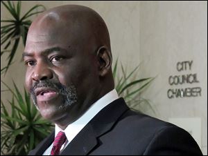 
Toledo Mayor Mike Bell urged customers to patronize restaurants still open at The Docks. 

