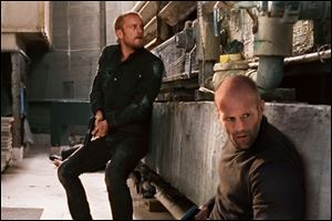 Ben Foster, left, plays the mechanic's protege Steve McKenna.