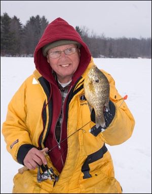 Paul Liikala of Cuyahoga Falls, Ohio, sports a dandy bluegill he took in Ashtabula County.