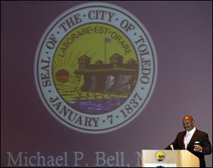 Toledo Mayor Mike Bell spent a large portion of his speech addressing a recent request to raise water and sewer rates in an effort to fund repairs to the city's water treatment and sewer plants.