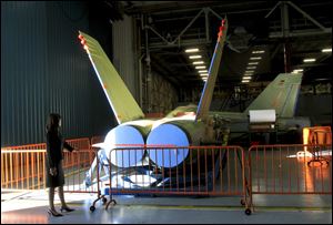 Two finished F/A-18 Super Hornets at Northrop Grumman Corp. in El Segundo, Calif., await shipment to Boeing Corp. for cockpit assembly. The F/A-18 had been slated for replacement.