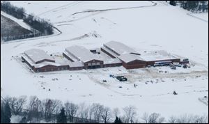 Construction is proceeding with Genoa schools' $24.4 million kindergarten-through-fifth-grade building that is to be finished in mid June. It is to replace two buildings.