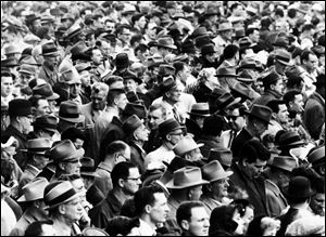 A crowd gathers in April, 1959, to watch the races at the former Maumee Downs. In its history, the track offered both thoroughbred and harness racing.