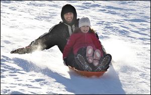 Jason McMillion and daughter Hailey, 9, of Rossford.
