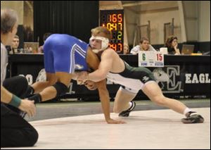 Alex Ortman, right, was Monroe county Wrestler of the Year as a Bedford senior.