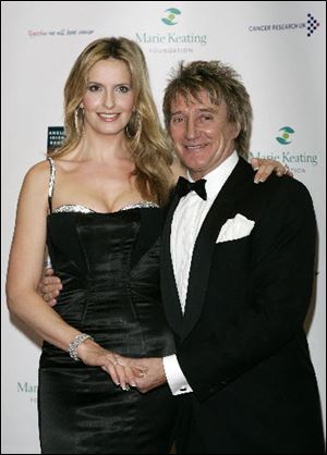 Rod Stewart, right, and his wife Penny Lancaster have a new baby boy named Aiden.