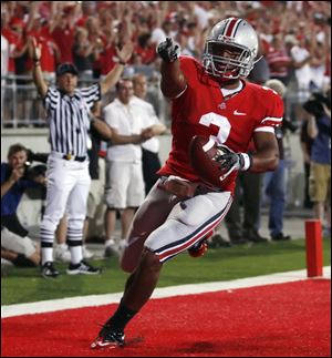 
associated press
Former Ohio State running back Brandon Saine, who had 337 yards rushing and 23 catches for 195 yards his senior season, hope his junior season (739 yards) coupled with a strong catching ability will make him a versatile option in the NFL.