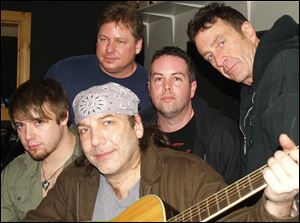 Clockwise from left: Chris Shutters, Greg Robie, Ev Harris, Brian Albright, and Mark Mikel.