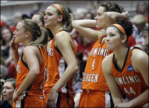 From left, Tracy Pontius, Jennifer Uhl, Maggie Hennegan, and Kelly Zuercher watch the final seconds of the game.