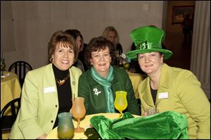Kathy Miller, left, Mary Kennedy, and Amy Gilman at the opening party for The Baroque World of Fernando Botero at the Toledo Museum of Art.
