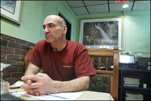 Kamal ‘Mel' Ahmad, owner of the Mango Tree, said Tamara McDaniel promised to work hard when he hired her six years ago. She kept her word, he said.