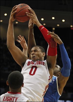 Jared Sullinger led the Buckeyes with 21 points and 16 rebounds against the Wildcats Friday night. This season, he was named the Big Ten freshman of the year and an All-American. He said the loss to Kentucky motivates him to return for another season.