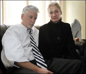 John Huffman, with his wife, Maureen, says firefighters can go over the speed limit, but not the nearly 100 mph cited by investigators at the crash. 