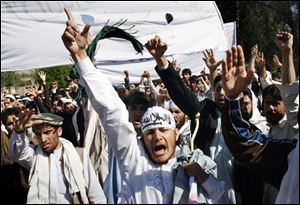 Afghan protestors shout anti-U.S. slogans during a demonstration in Jalalabad, Afghanistan on Sunday.