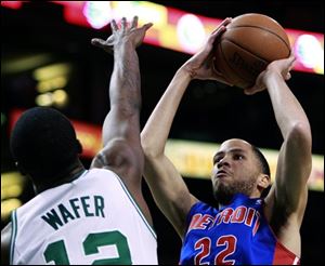 Detroit's Tayshaun Prince (22) shoots over Boston's Von Wafer in the fourth quarter.