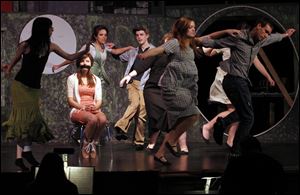 Rossford senior Allison Gerren, who plays Hope, and cast rehearse for the play Urinetown.