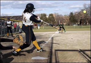 Notre Dame's Cassie Gillespie delivers the winning hit in Tuesday afternoon's game against Clay in City League play. The Notre Dame Eagles scored two runs in the bottom of the seventh to beat last year's conference champ Eagles 6-5. Gillespie was 3 for 4 on the day. 