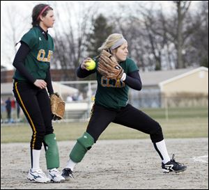 Clay pitcher Cassi Laberdee fields a ground ball and looks to make a play at first in the game.