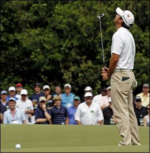 Jason Day of Australia reacts after missing a birdie putt on the first hole during the third round of the Masters. The most famous Australian to almost win was Greg Norman in 1996.
