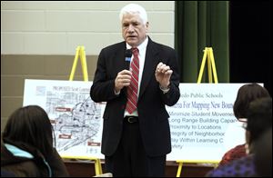 Superintendent Jerome Pecko, who spoke in March at Robinson Middle School at a hearing on new boundaries, praises the work of staff in gathering community input.