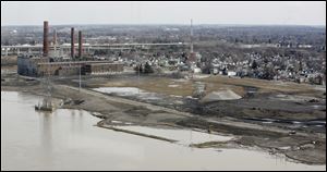 Under the proposed deal, the investors would have an option to buy the former Acme power plant, at left.